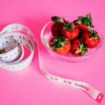 strawberries and measuring tape
