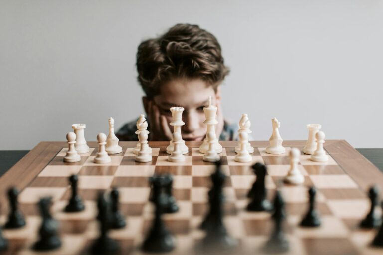 a boy playing chess